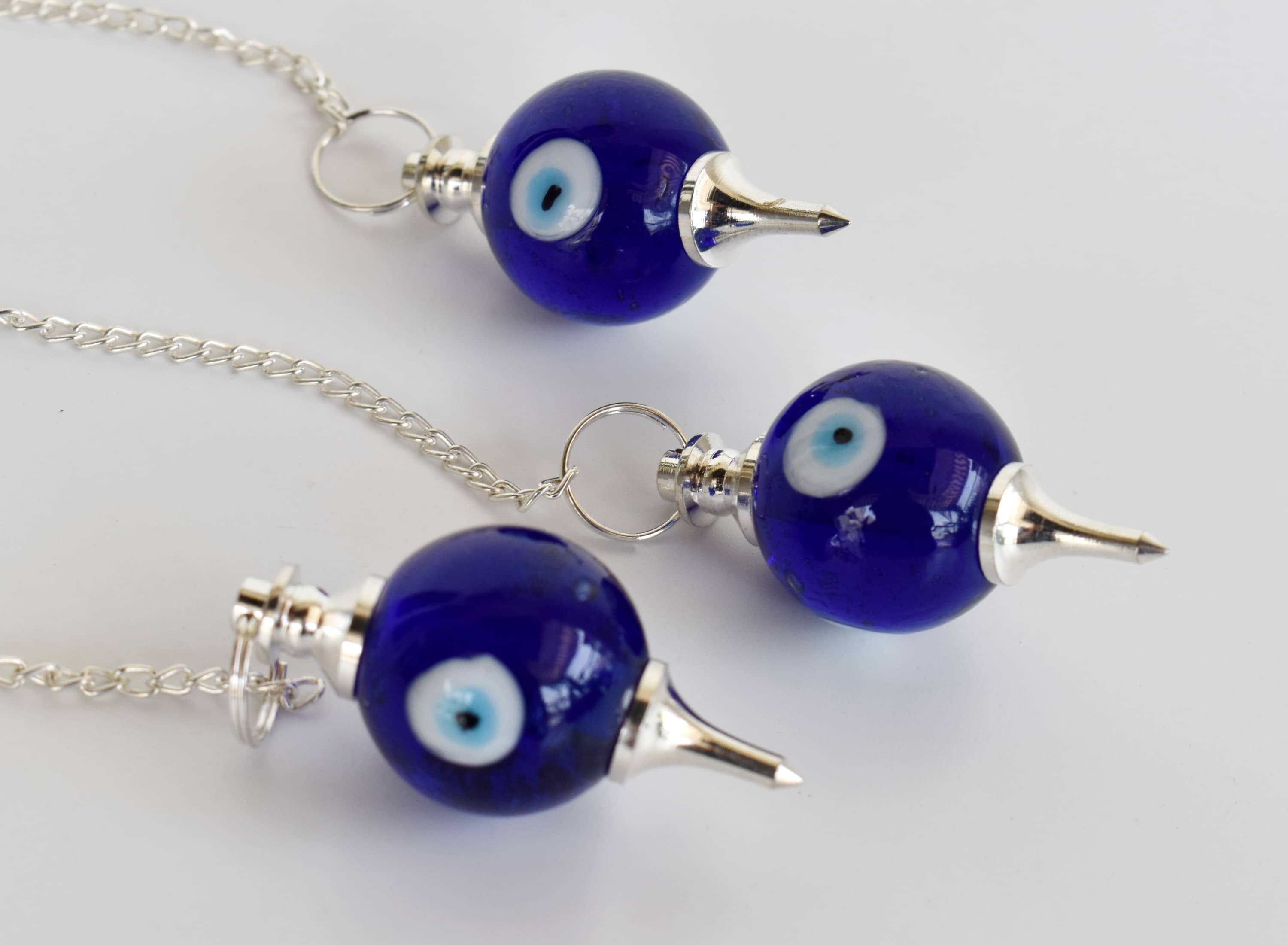 Evil Eye Crystal Pendulum – Protection & Intuitive Guidance Tool